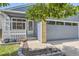 This charming home has an enclosed front porch with an attached two car garage at 17692 E Brown Cir, Aurora, CO 80013