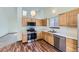 Bright eat-in kitchen with stainless steel appliances and lots of counterspace at 17692 E Brown Cir, Aurora, CO 80013
