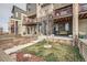 Cozy backyard patio with lounge seating and landscaping details at 5676 Emporia St, Denver, CO 80238