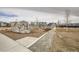 Community playground includes climbing rock, swings, and a safe play area for outdoor fun at 5676 Emporia St, Denver, CO 80238