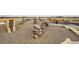 Neighborhood playground with natural log and rock climbing features at 5676 Emporia St, Denver, CO 80238