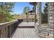Large deck with stone exterior at 7317 Fremont Pl, Larkspur, CO 80118