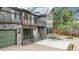 Beautiful home featuring stone accents, two decks, and a welcoming porch area with seating at 7317 Fremont Pl, Larkspur, CO 80118