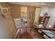 Bright foyer leading to a dining area and a kitchen area at 3251 Interlocken Dr, Evergreen, CO 80439