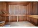 Warm wood sauna featuring built-in benches, perfect for relaxing and rejuvenating after a long day at 3251 Interlocken Dr, Evergreen, CO 80439