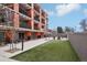 Exterior image showing building balconies and outdoor common space for recreation at 1495 Vrain St # 115, Denver, CO 80204