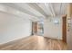 Bright, open living area with sliding doors to a balcony and views of the neighborhood at 1495 Vrain St # 115, Denver, CO 80204