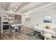 Open floor plan featuring a living room and kitchen area with modern finishes and natural light at 1495 Vrain St # 115, Denver, CO 80204