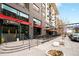 Restaurant exterior showcases outdoor seating, access to restaurant, landscaping, and sidewalk at 1495 Vrain St # 115, Denver, CO 80204