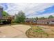 The backyard features a patio area, lawn, and a deck, ideal for outdoor entertaining and relaxation at 5861 S Orleans Way, Centennial, CO 80015
