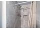 Bathroom with a stylish shower and decorative shower curtain for added privacy at 5861 S Orleans Way, Centennial, CO 80015