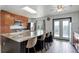 Spacious kitchen with a large granite island and stainless steel appliances at 5861 S Orleans Way, Centennial, CO 80015