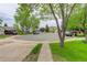 Landscaped front yard with brick walkway and cul-de-sac location at 5861 S Orleans Way, Centennial, CO 80015