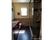 Bathroom featuring glass shower with custom tile work and modern fixtures at 5256 E 129Th Pl, Thornton, CO 80241