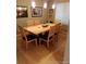 Formal dining room with wood floors, stylish furniture and natural light at 5256 E 129Th Pl, Thornton, CO 80241