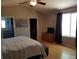 Bright main bedroom featuring vaulted ceilings, a large window, and ensuite bath at 5256 E 129Th Pl, Thornton, CO 80241