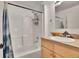 Bright bathroom with a tub, shower, and vanity, offering a clean and functional space at 9648 Yegge Rd, Morrison, CO 80465