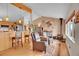 Comfortable living room with a wood-burning stove, hardwood floors, and an open layout at 9648 Yegge Rd, Morrison, CO 80465