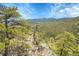 Mountain view from a scenic overlook, showcasing natural beauty and tranquility at 9648 Yegge Rd, Morrison, CO 80465