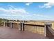 Spacious outdoor deck offering panoramic views of rolling hills and a serene landscape at 6743 Serena Ave, Castle Pines, CO 80108