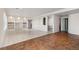 Spacious basement area featuring hardwood floors and a partial tile floor at 6743 Serena Ave, Castle Pines, CO 80108