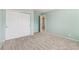 Bedroom featuring a closet, carpeted floor, and light green walls at 6743 Serena Ave, Castle Pines, CO 80108