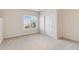 Bedroom with closet, carpet flooring, and window showing an outside view at 6743 Serena Ave, Castle Pines, CO 80108