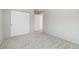 Well lit bedroom featuring a closet, carpeted floor, and neutral paint at 6743 Serena Ave, Castle Pines, CO 80108