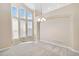 Elegant dining room with vaulted ceilings and bright windows at 6743 Serena Ave, Castle Pines, CO 80108