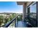 Balcony seating with a view of tree-lined streets and mountain at 20 Wilcox St # 410, Castle Rock, CO 80104