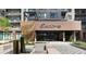 The Encore building has a brick entrance with a water feature in front at 20 Wilcox St # 410, Castle Rock, CO 80104