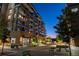 Upscale condo building showcasing outdoor seating and landscaped walkways, creating an inviting community atmosphere at 20 Wilcox St # 410, Castle Rock, CO 80104