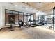 Bright fitness center with a variety of exercise equipment and large windows at 20 Wilcox St # 410, Castle Rock, CO 80104
