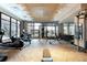 Well-equipped gym features modern exercise machines, weights, and large windows overlooking the exterior at 20 Wilcox St # 410, Castle Rock, CO 80104