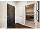 Hallway showcasing a laundry room with modern washer and dryer units, and good space at 20 Wilcox St # 410, Castle Rock, CO 80104