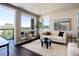 Living room featuring natural light, hardwood floors, sofa, and scenic views at 20 Wilcox St # 410, Castle Rock, CO 80104