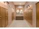 Well-lit mail room with individual mailboxes, a decorative shelf, and neutral decor at 20 Wilcox St # 410, Castle Rock, CO 80104