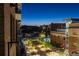 Night view of city and outdoor seating areas from the building's balconies at 20 Wilcox St # 410, Castle Rock, CO 80104
