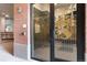 Exterior view of the entrance to the pet wash station with a decorative glass door at 20 Wilcox St # 410, Castle Rock, CO 80104