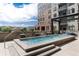 Rooftop pool with seating and scenic views of the city at 20 Wilcox St # 410, Castle Rock, CO 80104