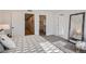 Bright bedroom with carpeted floor, walk-in closet, and ample natural light at 2945 S Elati St, Englewood, CO 80110