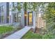 Modern two-story home with gray brick exterior and landscaped front yard at 2945 S Elati St, Englewood, CO 80110