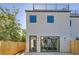 Modern home exterior with rooftop deck and fence at 2945 S Elati St, Englewood, CO 80110