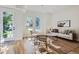Bright and airy living room with hardwood floors and large windows at 2945 S Elati St, Englewood, CO 80110