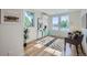 Home office with hardwood floors, large windows, and ample natural light at 2945 S Elati St, Englewood, CO 80110