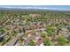 This aerial view showcases the property situated in a Gathering-friendly neighborhood near community amenities at 433 S Vaughn Way, Aurora, CO 80012