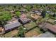 A bird's eye view shows the home with a spacious, enclosed backyard, perfect for outdoor activities at 433 S Vaughn Way, Aurora, CO 80012