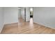 Spacious bedroom with hardwood floors and mirrored closet doors, offering ample space at 433 S Vaughn Way, Aurora, CO 80012