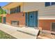 Close up view of a charming two-story home with brick accents at 433 S Vaughn Way, Aurora, CO 80012