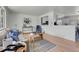 Spacious living room seamlessly connecting with an open concept kitchen at 433 S Vaughn Way, Aurora, CO 80012
